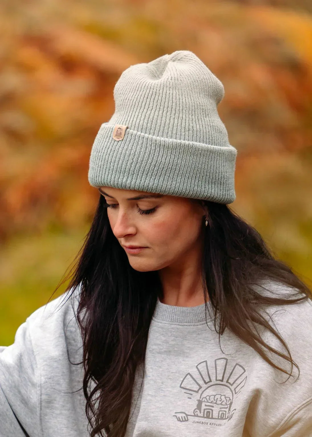 Eco-friendly beanie and sweatshirt for outdoor adventures in autumn