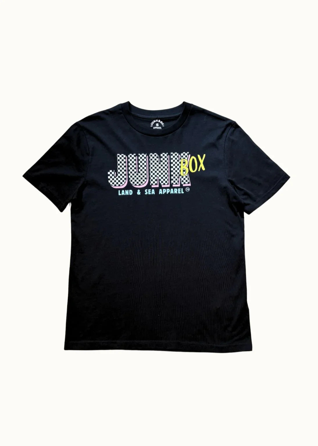 Black T-shirt with checkerboard 'JUNKBOX' text and 'LAND & SEA APPAREL' slogan print