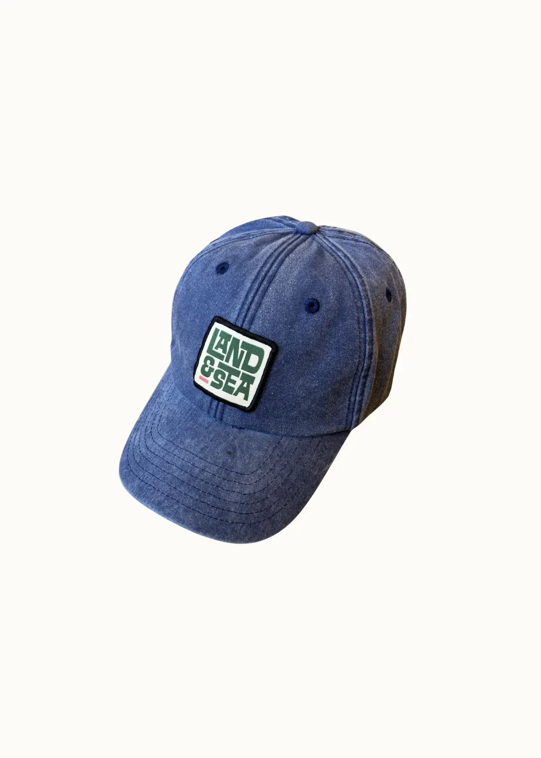 Blue cap with a logo on a white background