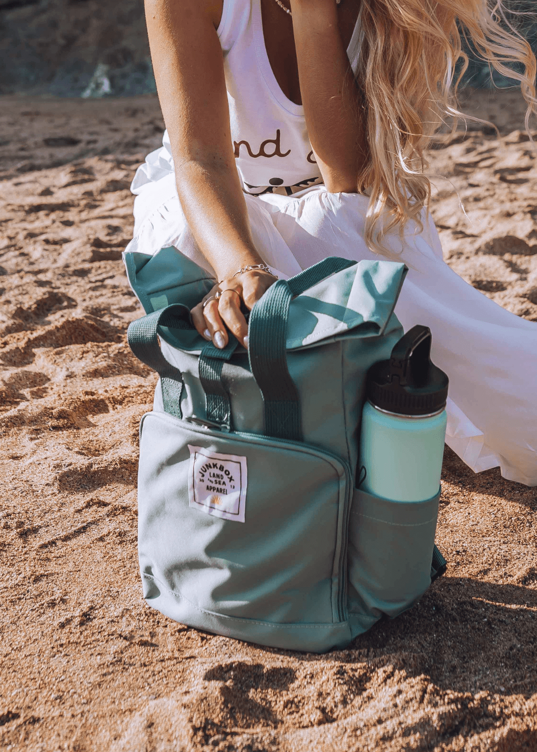 The Mini Recycled Roll Top Backpack in Sage Green