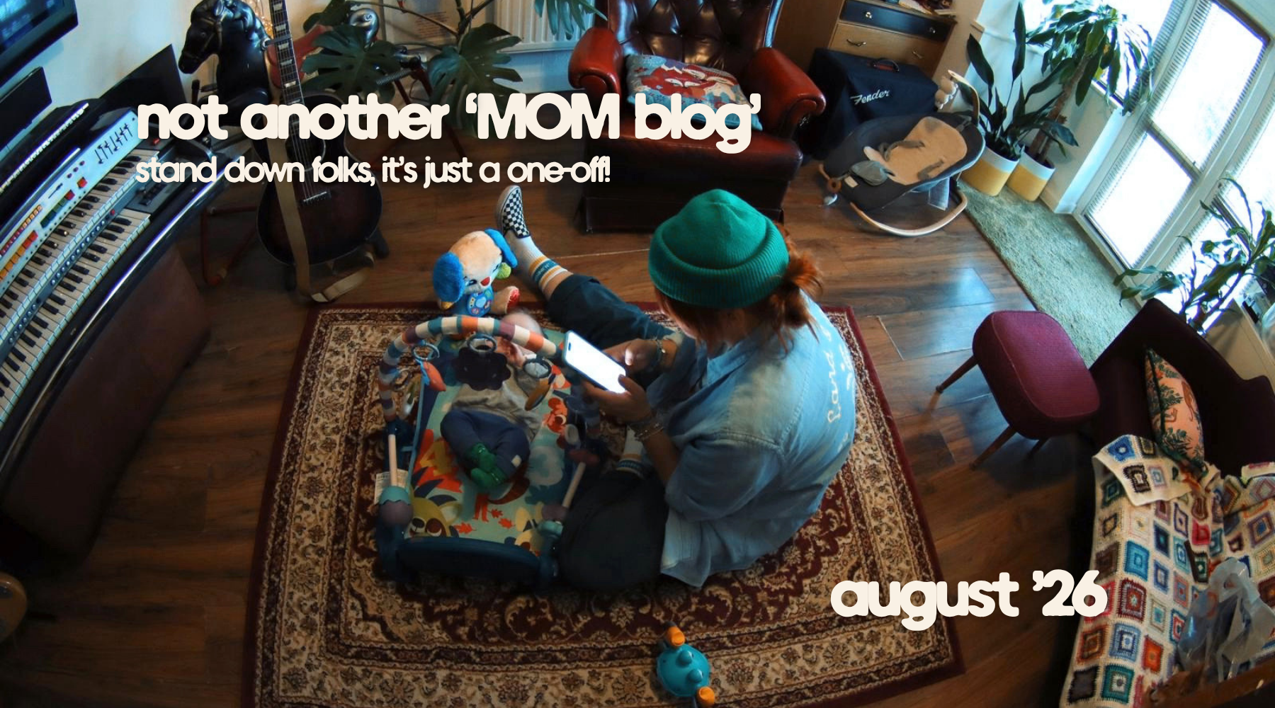 a working mom watching the baby and working on a phone