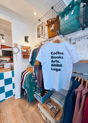 White t-shirt with text in a clothing store