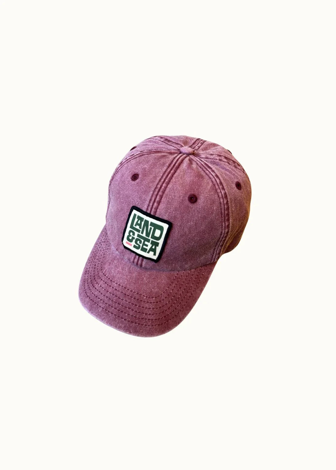 Red cap with a logo on a white background