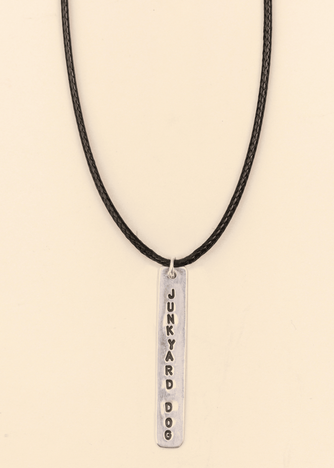 junkyard dog surf slang handmade sterling silver and cord necklace