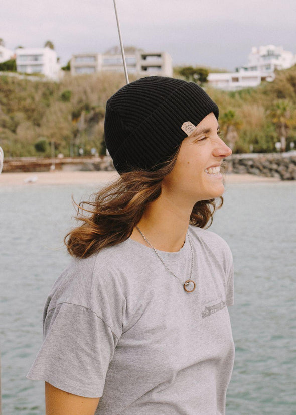 organic black fisherman beanie hat side view