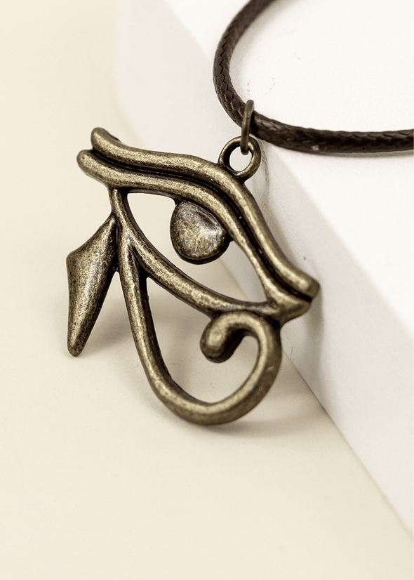junkbox antique gold eye of Horus cord necklace