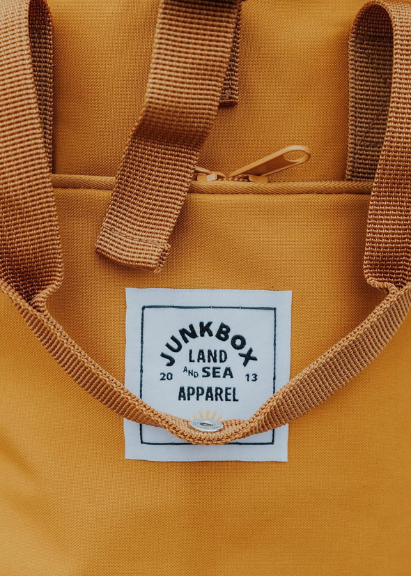 mustard roll top junkbox backpack